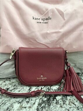 kate spade Burgundy Pebbled Leather Crossbody with Tassel